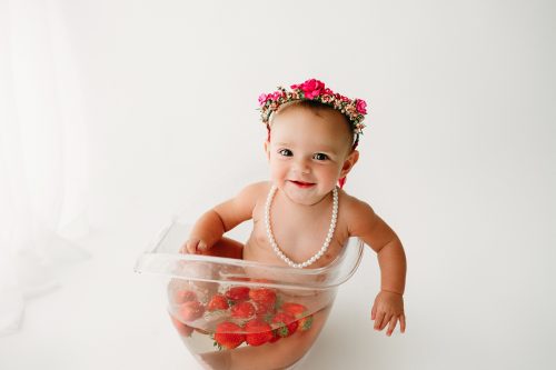 Baby in tub for baby milestone photo session Indianapolis