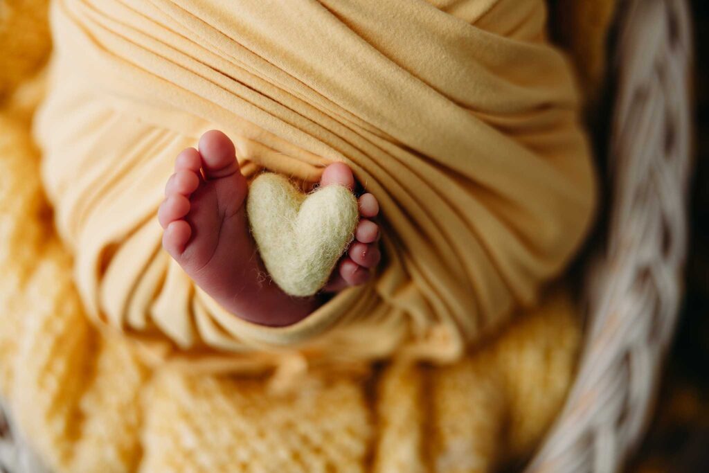 yellow heart on toes