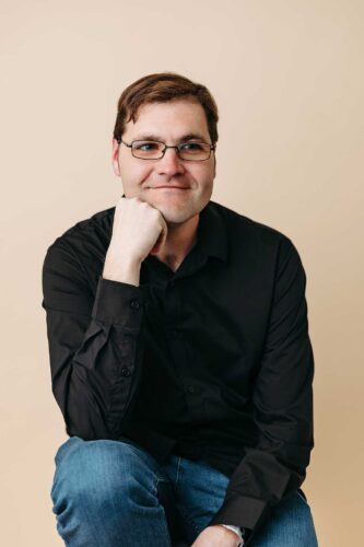casual jeans button up sitting portrait