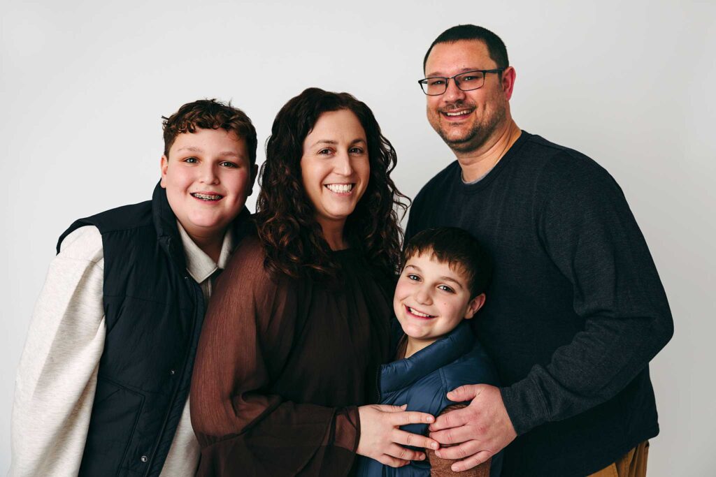family photo 2 boys white paper